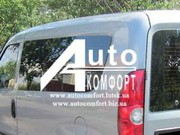 Задний салон,  левое окно,  короткая база на Fiat Doblo 2010